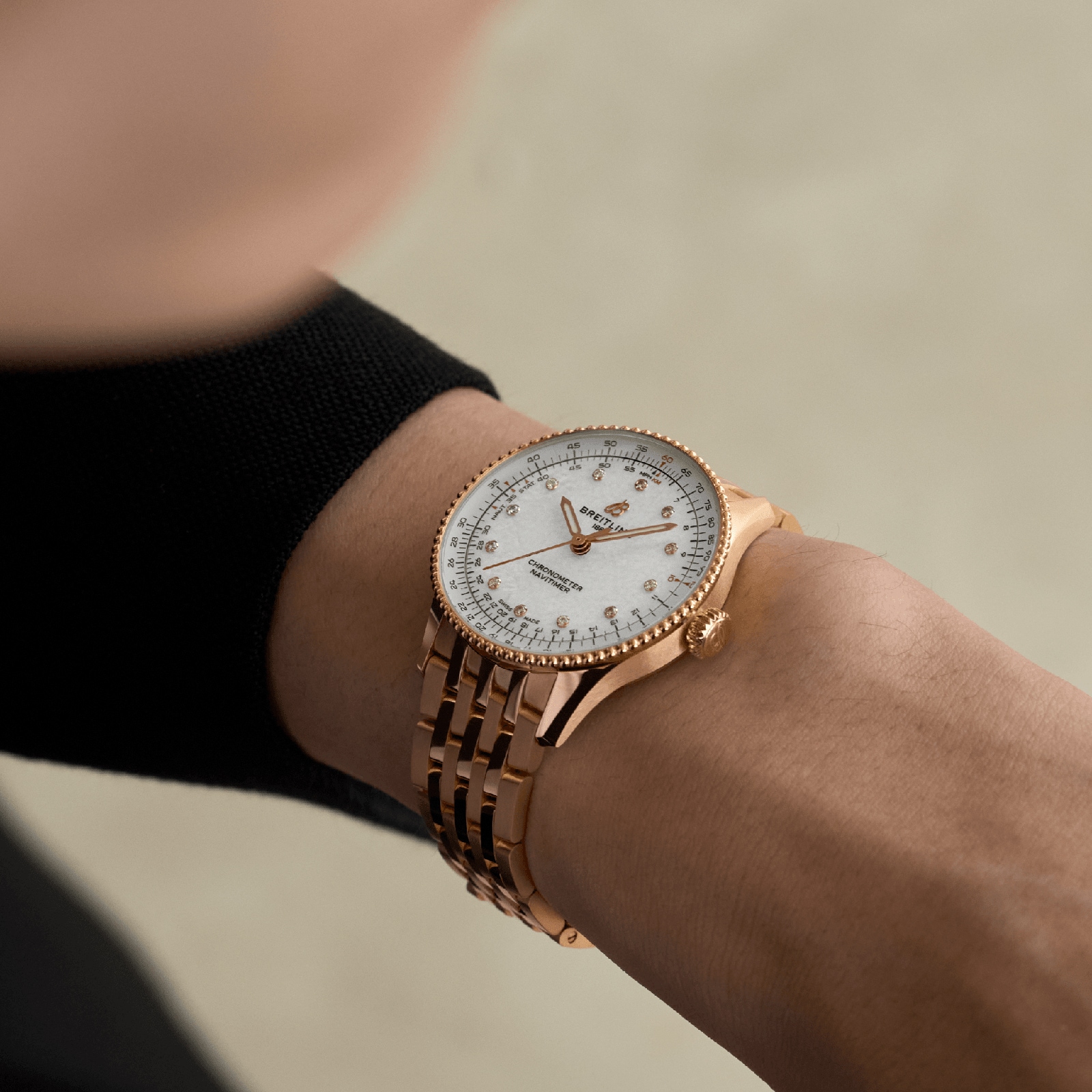 Replica Breitling Navitimer 36mm Ladies details White Mother Of Pearl 18k Red Gold R17327211A1R1